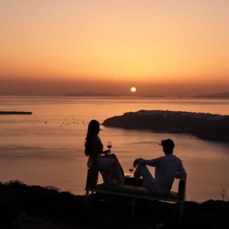 Couple sunset gazing is one of the top things to do in Santorini.